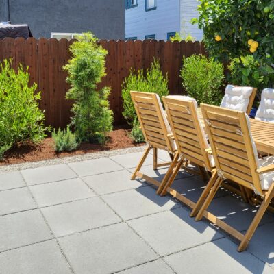 13 low main out concrete paving stones with metal furniture